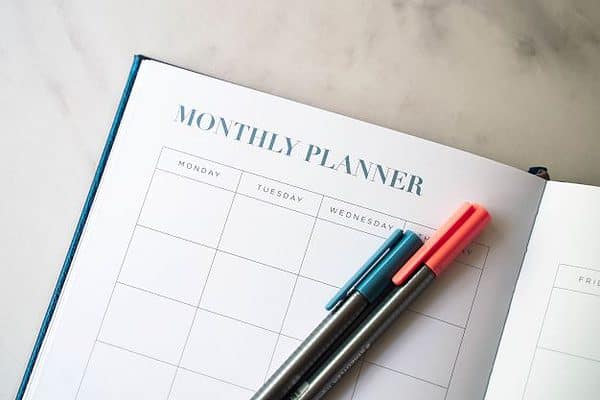 monthly planner with pens